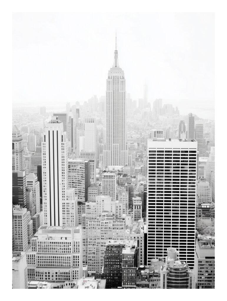 Black and White iconic Empire State Building and city skyline