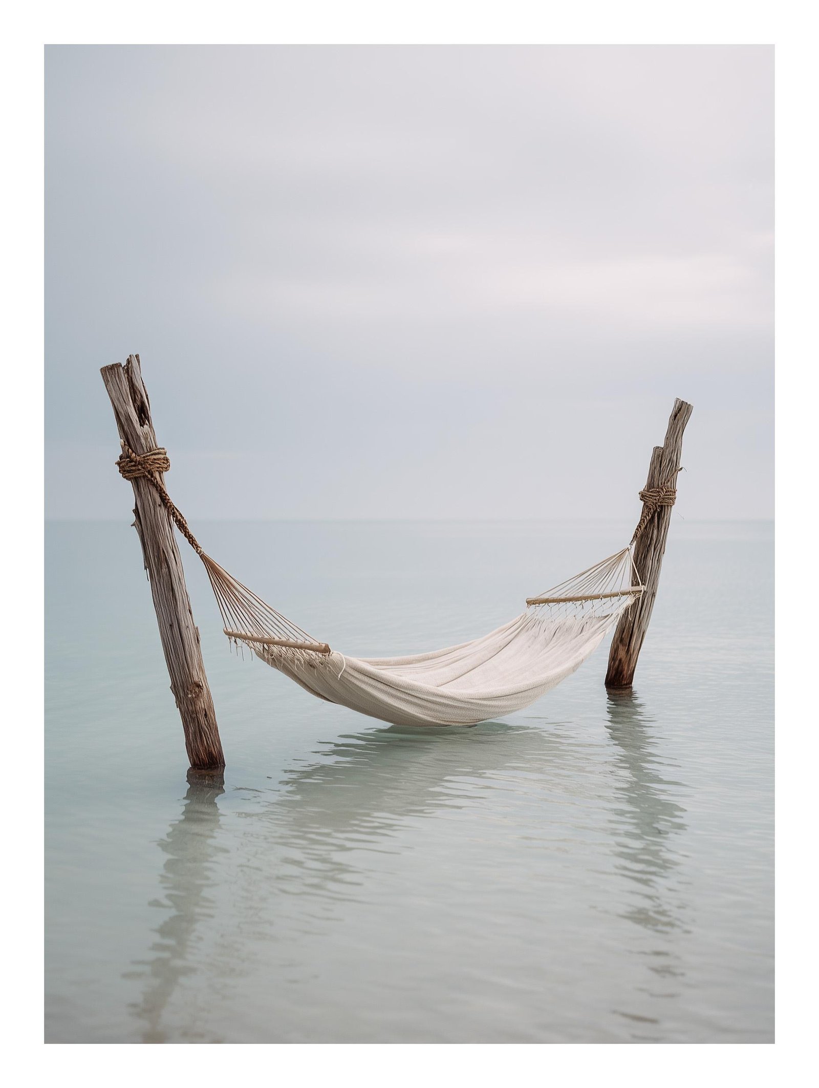 Hammock over calm ocean poster 