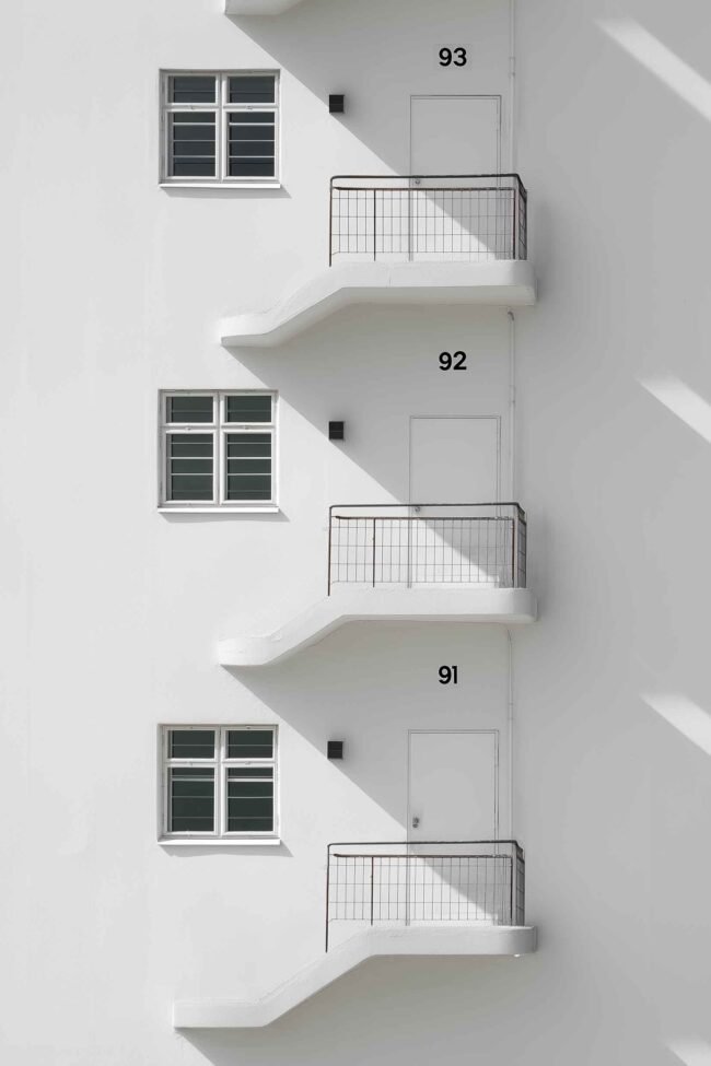 Sleek, white apartment building