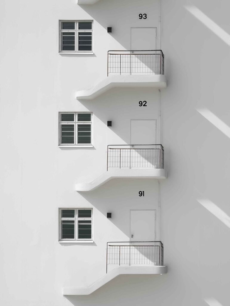 Sleek, white apartment building