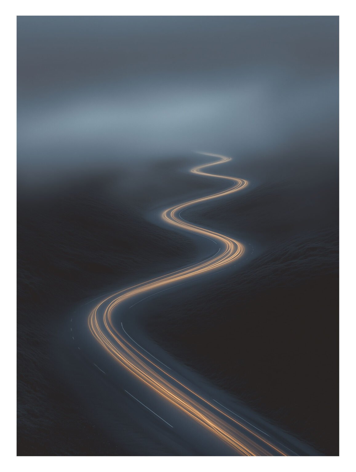 Glowing path cutting through misty hills