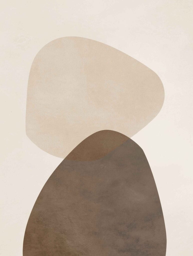 two minimalist organic shapes in soft beige and brown tones