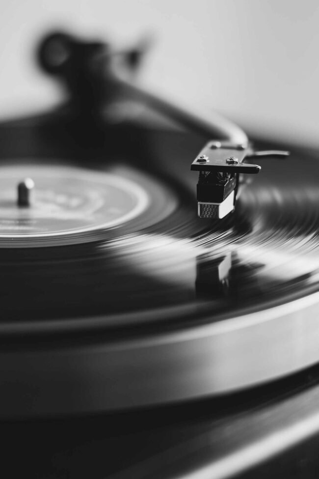 poster of a vinyl record on a turntable